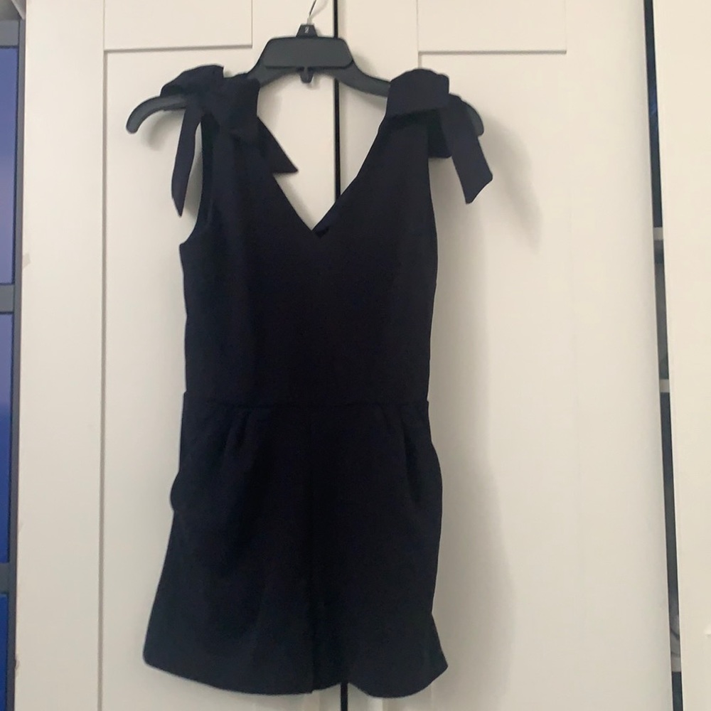 Navy jumpsuit romper with pockets bow shoulders